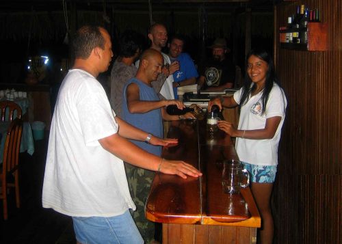 5 ECUADOR AMAZON TOURS [FROM QUITO]: Enjoying a friendly evening at the Cuyabeno lodge when visiting the Amazon in Ecuador.