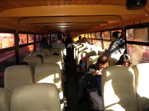 ECUADOR DEVILS NOSE: Interior of a restored bus-train on train wheels.