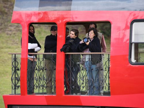 ECUADOR DEVILS NOSE: Watching from the balcony of the luxurious Crucero Train. 