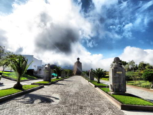 WHAT IS MITAD DEL MUNDO MONUMENT? The main walkway towards the monument. 