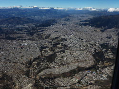 QUITO AIRPORT CODE  [UIO] & DEPARTURES: Quito from the air.