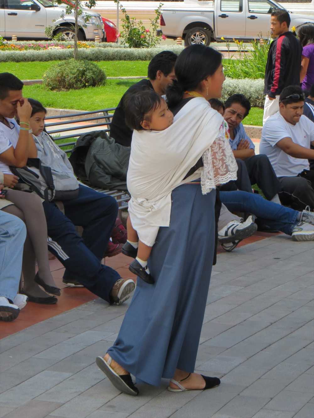 Otavalo girl with her baby on her back