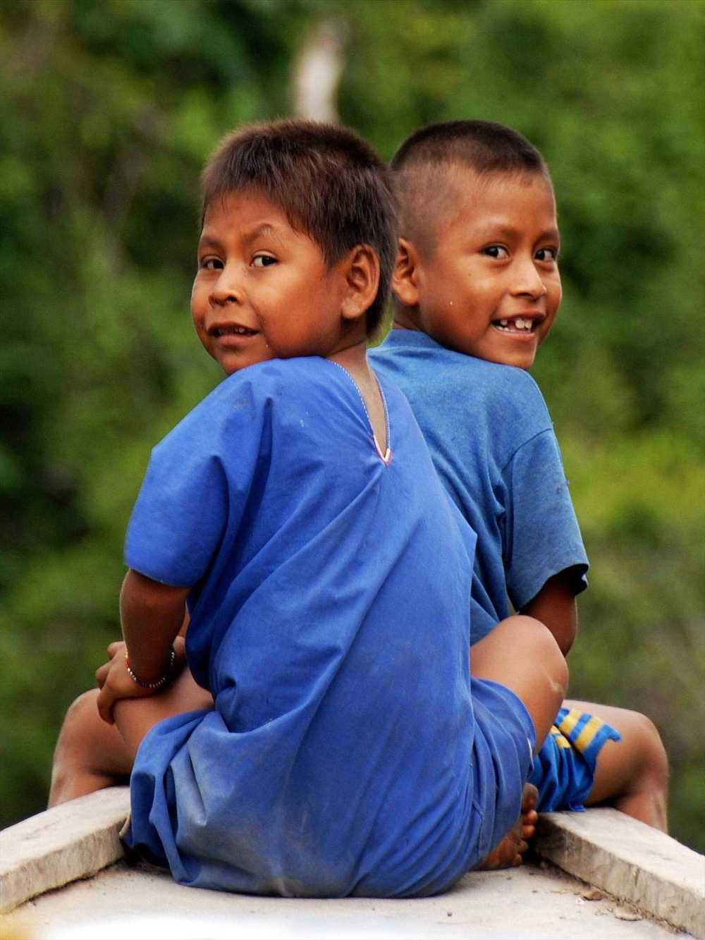 Indian boys in a canoe